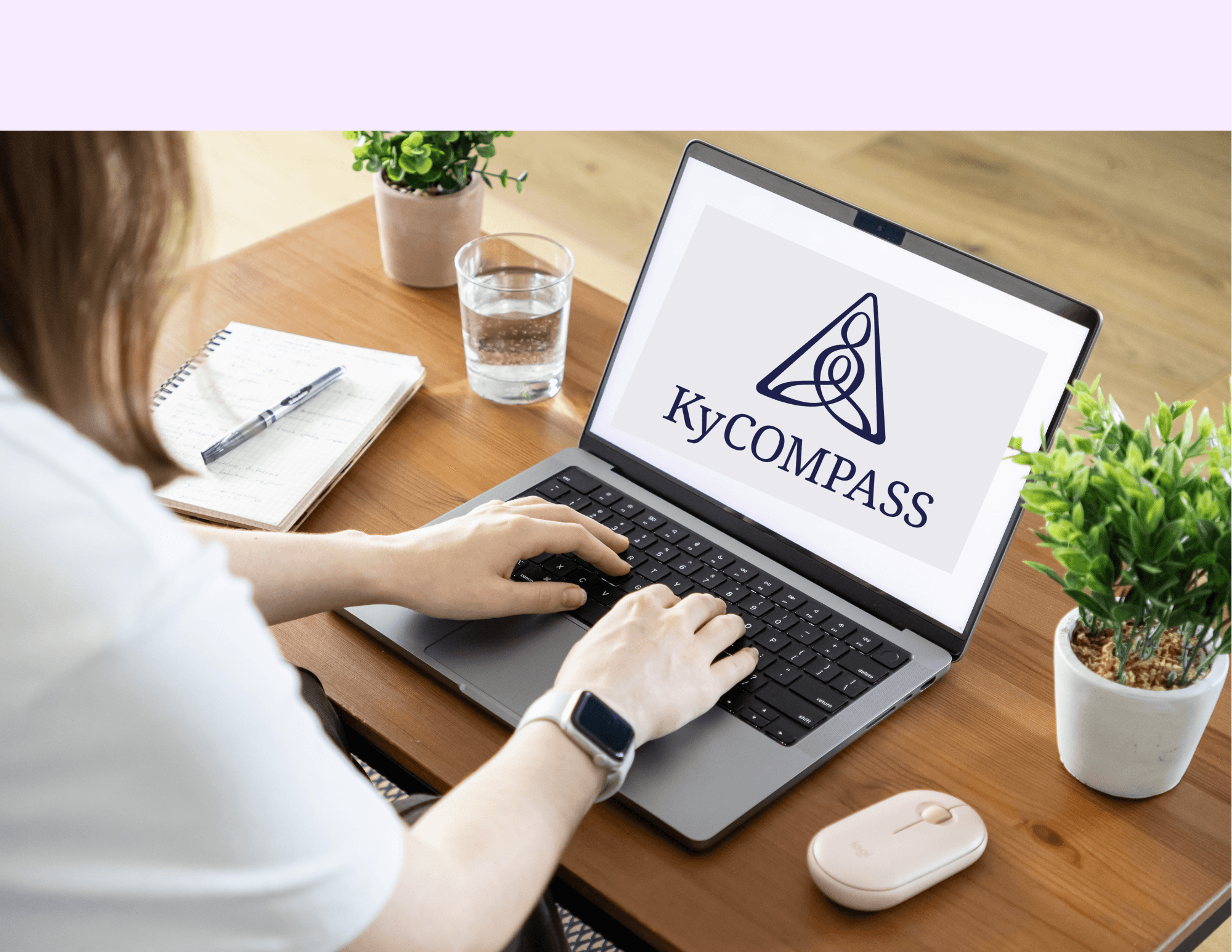 Doctor asking KyCOMPASS for help from laptop