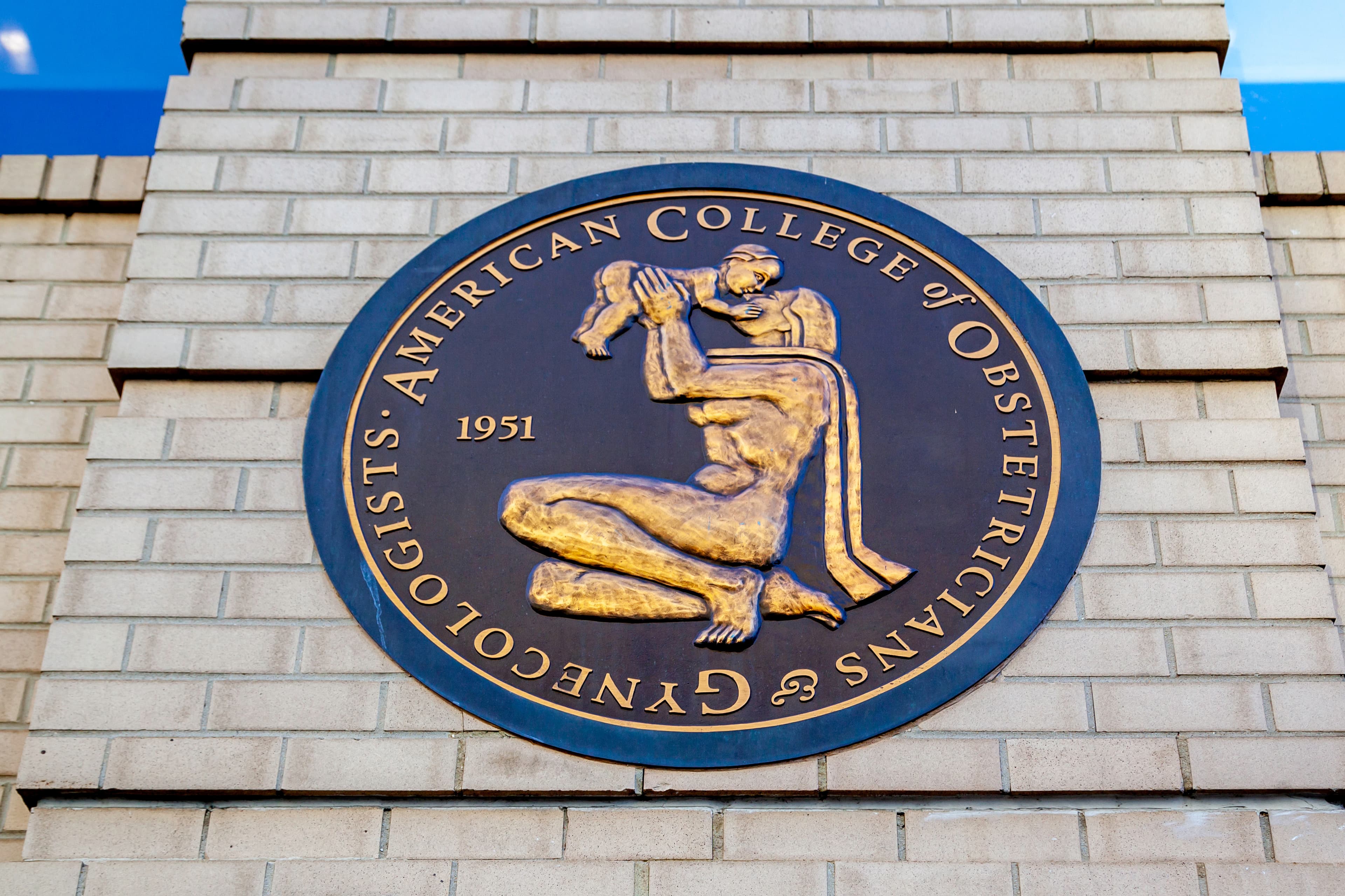 Photo-Washington D.C., USA - February 29, 2020: Seal of The American College of Obstetricians and Gynecologists (ACOG) at its headquarters in Washington D.C.